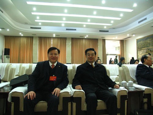 王董与最高人民法院院长、原湖南省省长周强在一起